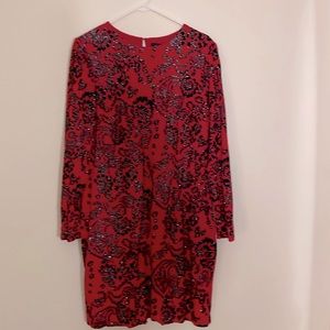 This dress has it all, gorgeous red color, sparkles, bodycon style and sleeves!